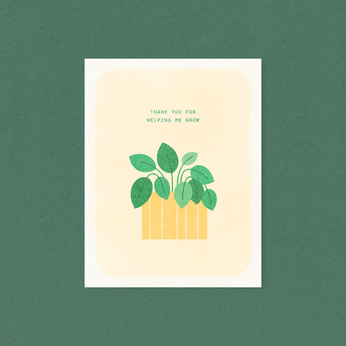 Whimsical botanical risograph thank you card printed with green and yellow vegetable-based inks, featuring a leafy green plant in a striped orange pot on a soft peach background. The words "Thank You For Helping Me Grow" appear above, and a kraft envelope is included. A delightful handmade card from Seattle, WA by Minna May.